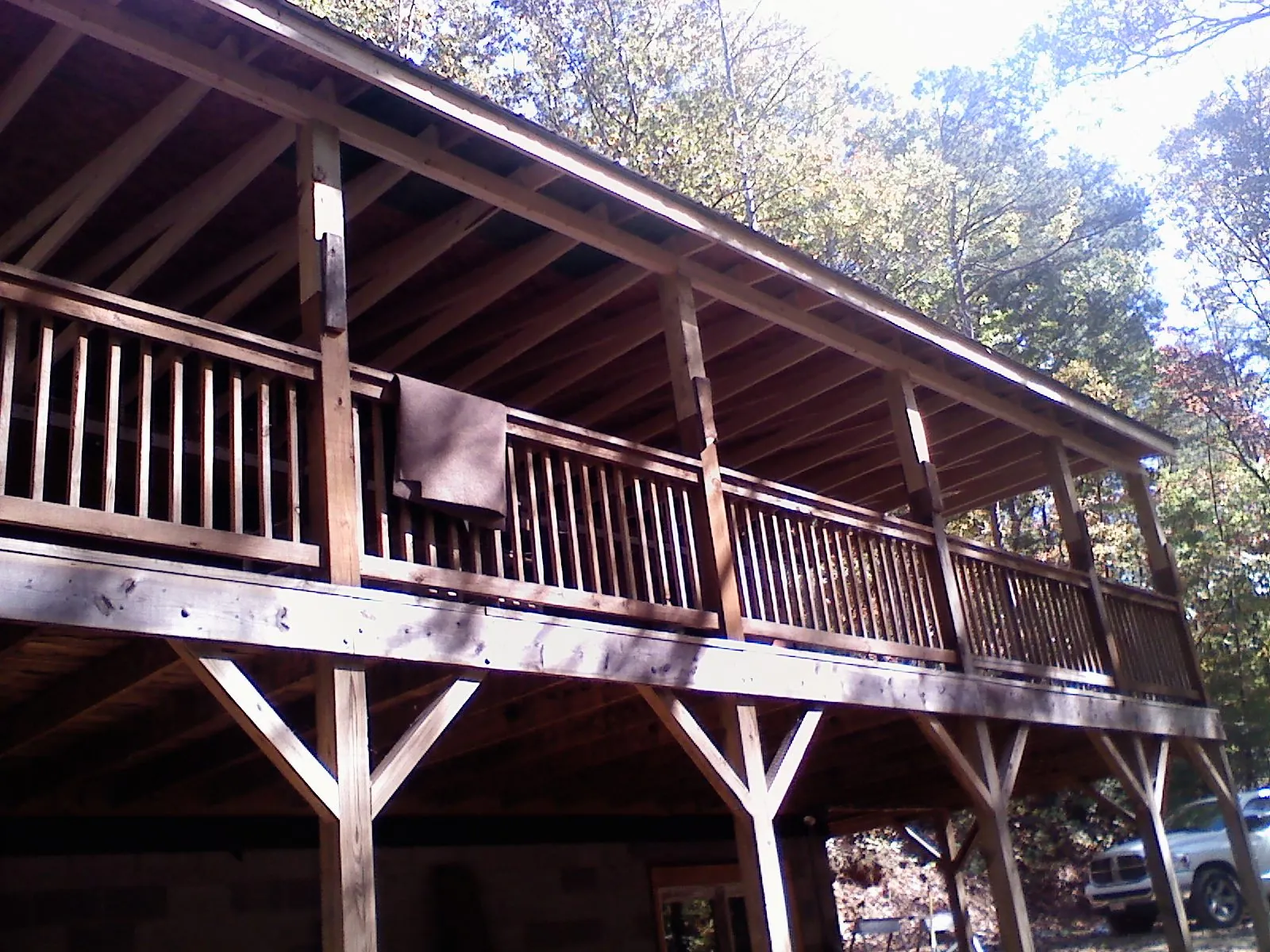 Timber framing under a new elevated porch and deck — Roof Leak Repair in Mims by Roofing Brothers